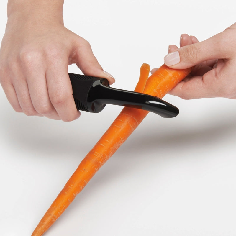 Éplucheur dentelé pivotant